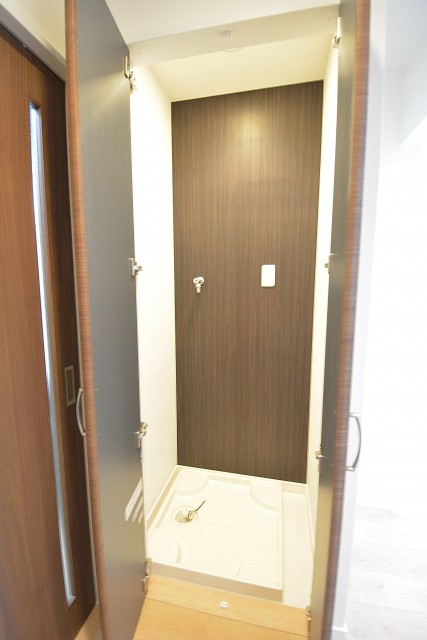 古河松原マンション　洗濯機置場