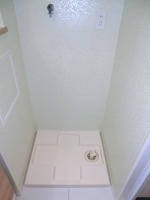 洗濯機置き場のクロスが素敵です