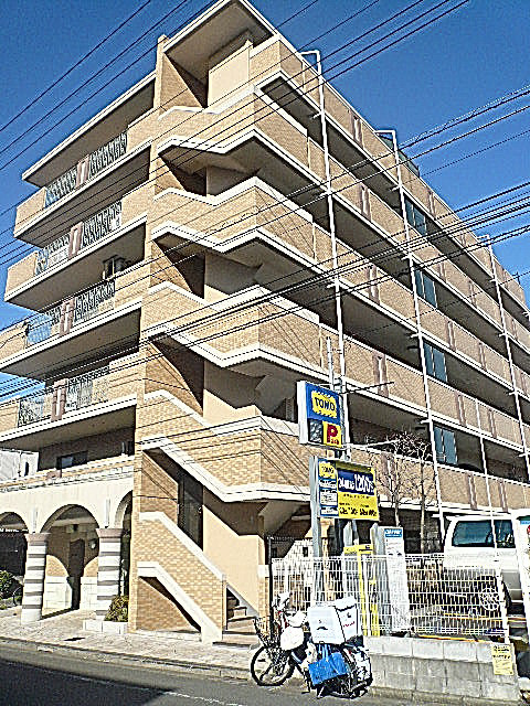 フローレンスパレス多摩川　タイル貼りの外観です。