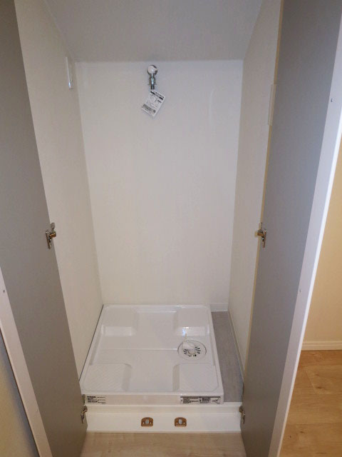 キッチンの一角に洗濯機置き場