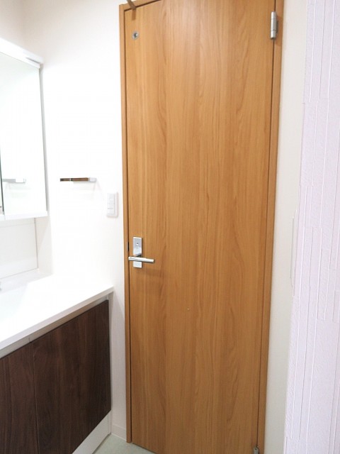 プチモンド目白　トイレ扉